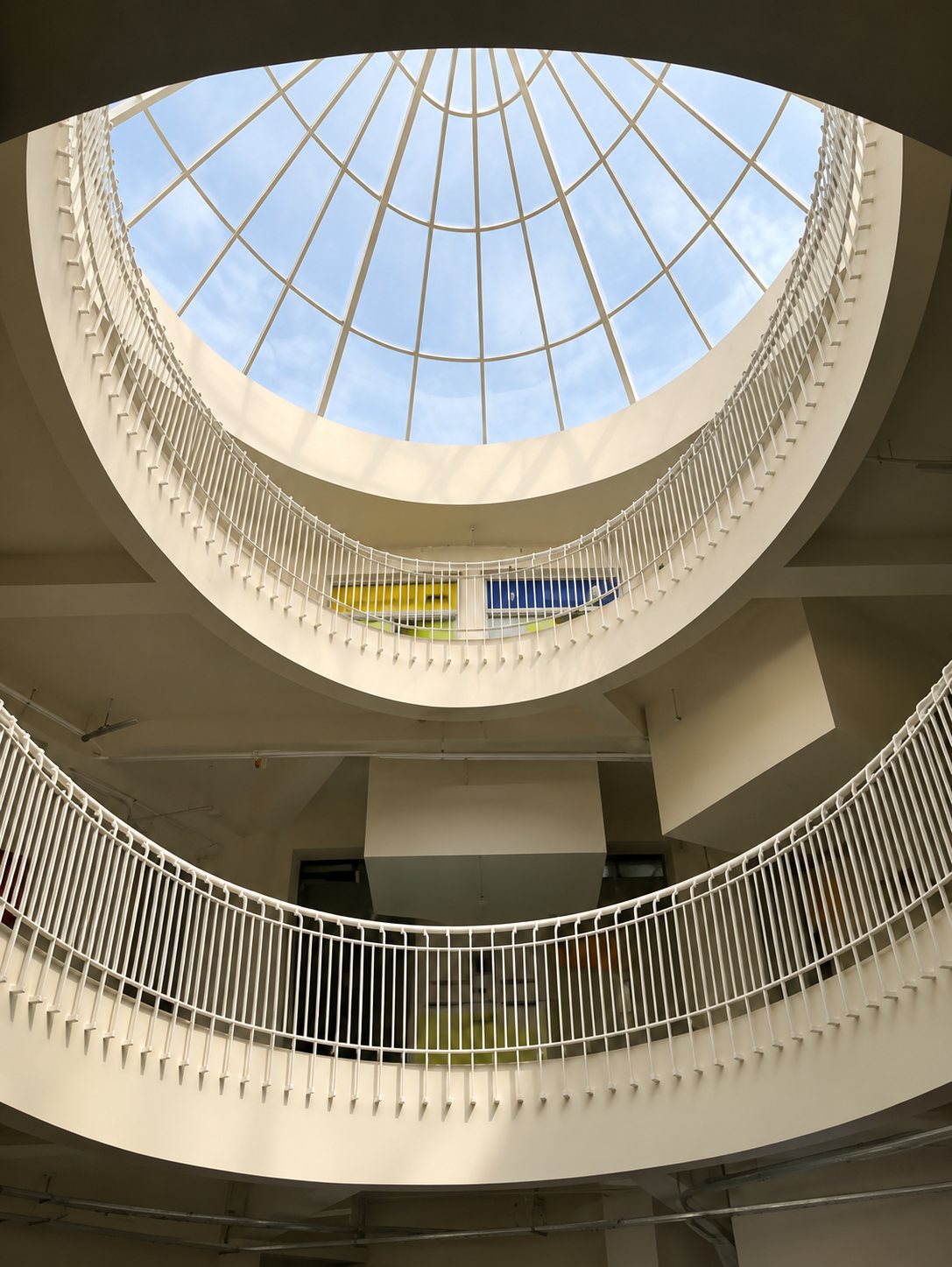 KC High School, Chennai - elliptical skylight above curved balcony railings